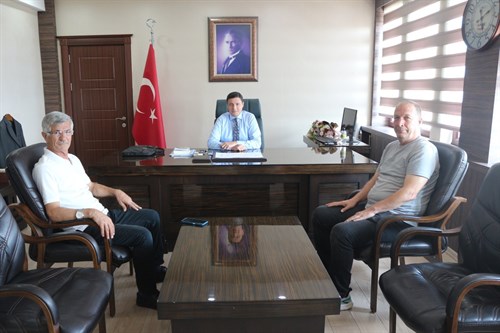 Prof. Dr. Bilal YILDIRIM ve Genel Sekreter Erhan AKKAYA Kaymakamımız Mehmet Faruk SAYGIN' ı makamında ziyaret etti.